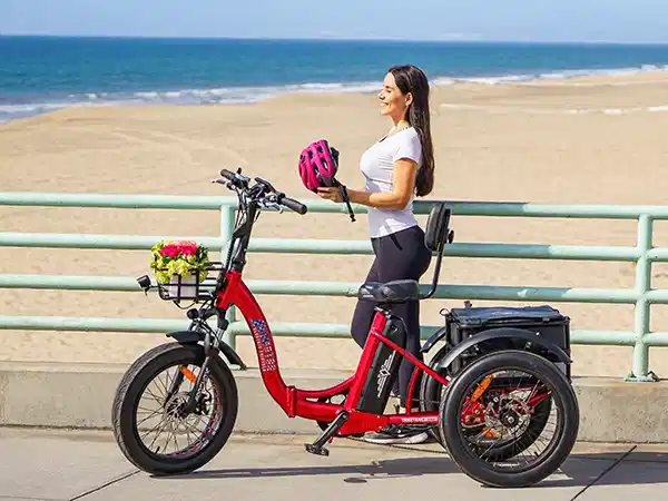 A woman riding a folding electric trike